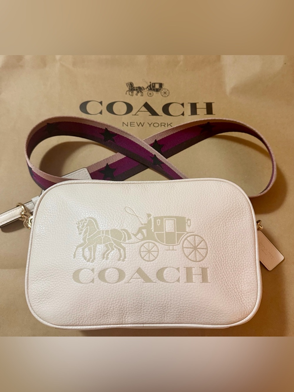 Coach Jes Crossbody Pebbled Leather Horse Carriage Embossed Bag in Chalk.